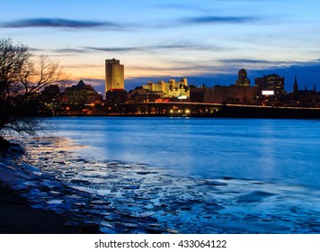 Albany NY Skyline Wintertime, From Rennsaeler NY, Looking Across. Reflections On The Hudson River Include Some Ice. Capital City Of NY.