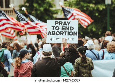 Albany, NY / USA - June 3, 2019: Pro Life Rally At The New York State Capital Building In Albany New York. Protesters Gather Outside Of Albany State Capital Building To Protest Abortion Laws 