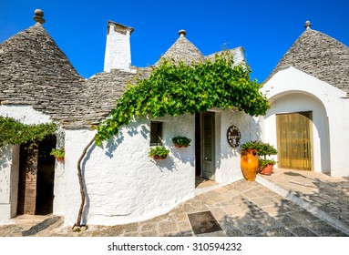 Alberobello, Italy, Puglia. Unique Trulli houses with conical roofs. Trullo, trulli, a traditional Apulian dry stone hut with a conical roof.