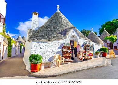 Alberobello, Puglia, Italy: Typical houses built with dry stone walls and conical roofs of the Trulli, in a beautiful day, Apulia