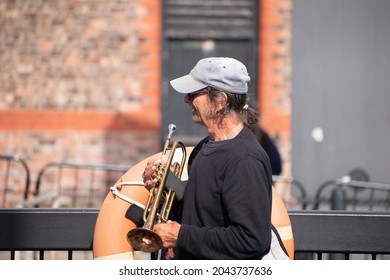 Albert Dock, Liverpool  UK - September 16th 2021: Trumpet Busker