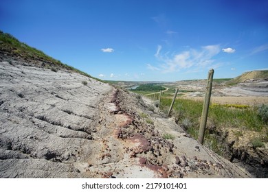 Alberta Badlands Landscape With Fields Hills And Road