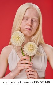 Albino Girl With White Flowers