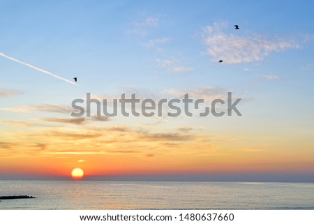 Alboraya,Valencia, Spain: 08.08.2019; The colorful sunrise on the Mediterranean sea