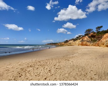 Albufeira sunny seashore, Maria Luísa beach, Algarve Portugal.