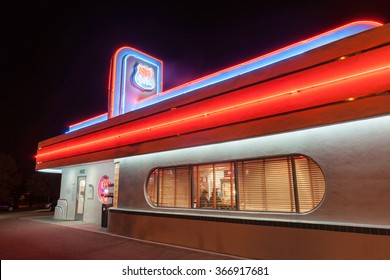 ALBUQUERQUE, USA - 1950's style Attention grabbing neon signage of 66 Diner on Historic Route 66 illuminated at night on September 19, 2015, Albuquerque New Mexico USA.