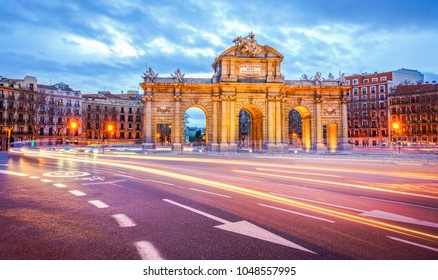 The Alcala Door (Puerta de Alcala) is a one of the ancient doors of the city of Madrid, Spain. It was the entrance of people coming from France, Aragon, and Catalunia. It is a landmark of the city. - Shutterstock ID 1048557995