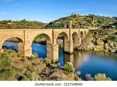 Alcantara bridge over Tajo river,Caceres,Extremadura,Spain - Shutterstock ID 2127548045