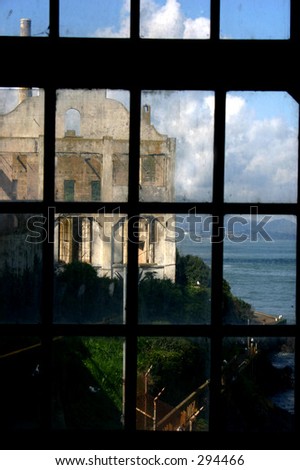 Similar – On the left, part of Gaeta Cathedral (Italy) On the right, an old building and the silhouette of an umbrella line. In between the view of the old town and the port of Gaeta.