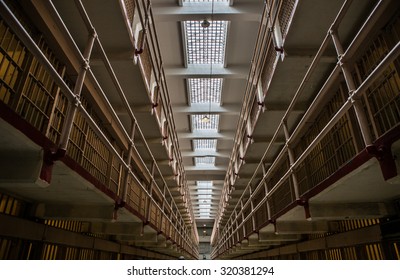 ALCATRAZ, USA - JUNE 10, 2015: Prison Corridor inside the Alcatraz Penitentiary, with the row of rooms