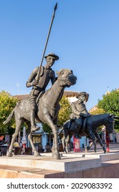 Alcazar de San Juan, Castilla-La Mancha, Spain - August 7, 2021: Bronze statue of Don Quixote and Sancho Panza