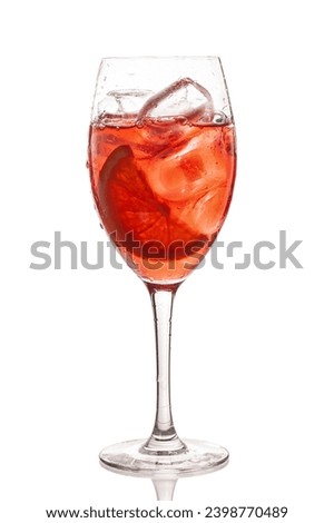 Alcohol cocktail with fruits isolated on white background. Aperol spritz cocktails. Cocktail drink with orange slices and ice.