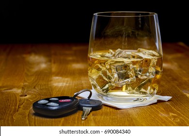 Alcohol Drink And Keys - Drinking And Driving Concept 