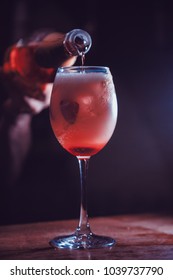 Alcohol Drink With Strawberry On Bar. Cocktail