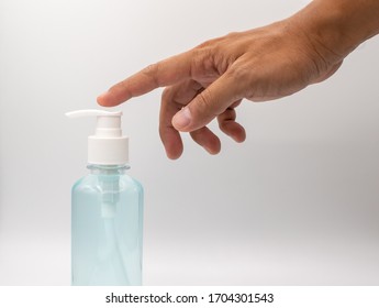 Alcohol gel bottle in a hand safety for coronavirus,covid 19 isolated on white background - Shutterstock ID 1704301543