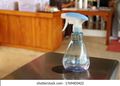 Alcohol Hand Sanitizer Spray Bottle Is Placed On The Counter. Anti-Bacterial Sanitizer Spray.