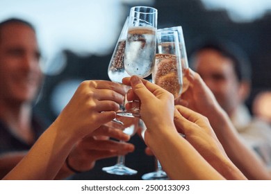 Alcohol, hands and toast with friends outdoor for celebration or social gathering together closeup. Bubbles, champagne and festive cheers with group of people cheering for milestone or new years