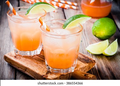 Alcohol Tequila Sunrise Cocktail With Ice And Lime