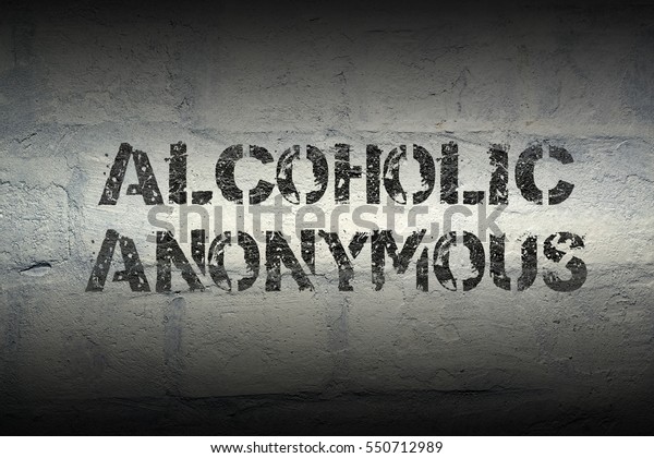 alcoholic anonymous stencil print on the grunge\
white brick wall