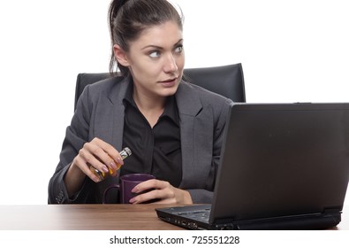 Alcoholic Business Woman Sneaking A Drink At Work Sitting At Her Desk