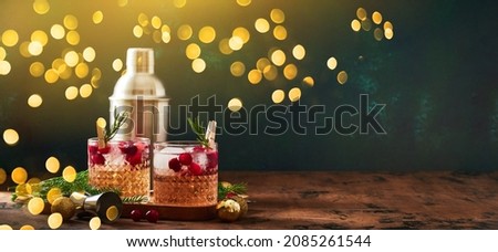 Similar – Image, Stock Photo Transparent pink alcohol cocktail, vodka gin-tonic