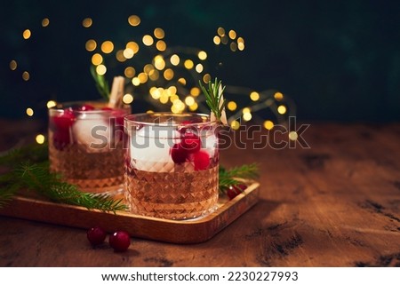 Similar – Image, Stock Photo Transparent pink alcohol cocktail, vodka gin-tonic