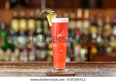 Alcoholic cocktail on the basis of gin, cherry, orange and liqueur 