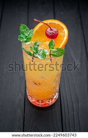 Alcoholic cocktail with orange juice. Photo for the menu.