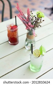 Alcoholic Cocktail Row On Caffee Table, Colorful Party Drinks
