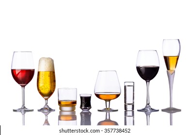 Alcoholic Drinks In A Row Isolated On White Background