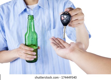 Alcoholic Giving A Car Key To Someone For Driving The Car