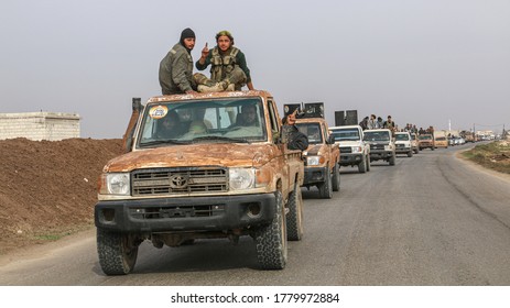 Aleppo, Syria 16 October 2016:
Syrian Opposition Fighters Raise Their Hands Of Victory Over The Military Vehicles After The Victory Over ISIS