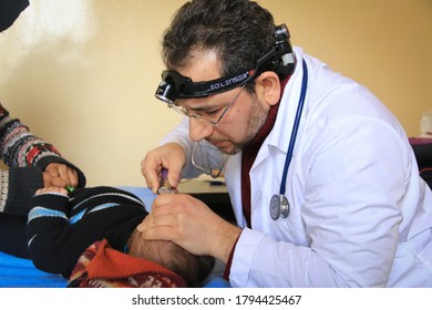 Aleppo, Syria, February 19, 2020:
A Doctor Treats A Patient In The Hospital