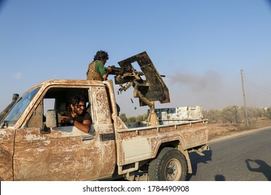 Aleppo, Syria March 14, 2016:
Syrian Armed Opposition Soldiers Open Fire With Heavy Weapons Towards ISIS Fighters.
Sparks And Fire Smoke