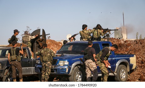 Aleppo, Syria March 14, 2016:
Syrian Armed Opposition Soldiers Open Fire With Heavy Weapons Towards ISIS Fighters.
Sparks And Fire Smoke