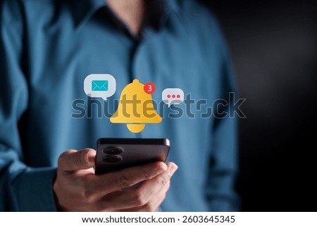 Alert notification concept. Push Notifications, Web Reminders, Time Table and Announcements. Person using smartphone with notification icon on virtual screen.