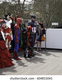 ALESSANDRIA, ITALY - MARCH 19, 2017: masked actors as Spiderman, Captain America and other characters in ad of Alecomics, annual event dedicated to comics