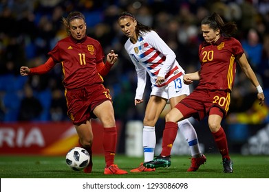 Alex Morgan (Orlando Pride) Of USA And Andrea Pereira And Alexia Putellas Of Spain During The Friendly Match Between Spain And USA At Rico Perez Stadium In Alicante, Spain On January 22 2019