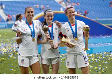 Alex Morgan, Rose Lavelle, Megan Rapinoe celebrate with their trophy during the FIFA Women's World Cup France 2019 Final football match USA vs Netherlands on 7 July 2019 Groupama Stadium Lyon France