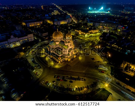 Alexander Nevsky Cathedral, Sofia, Bulgaria at Night. Parliament, university, soccer game in the background.
