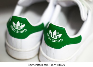 white shoes with green back