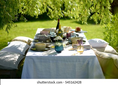 Alfresco Dining, Table Set For An Evening Meal Outside