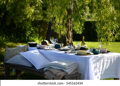 Alfresco Dining, Table Set For An Evening Meal Outside