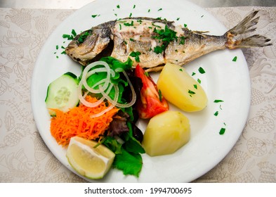 Algarve Cuisine Is Famous For It's Seafood. Fresh Fish Is Served With Potato In Numerous Places In The City Of Faro