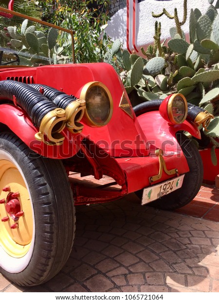 ALGIERS, ALGERIA - APRIL 10, 2018: a vintage\
fire engine is on display at the garden of national museum civil\
protection in Hydra district\
Algiers.