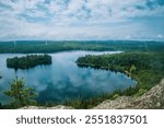Algonquin overlooking lake with cloud reflection 