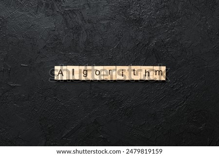 Algorithm word written on wood block. Algorithm text on table, concept.