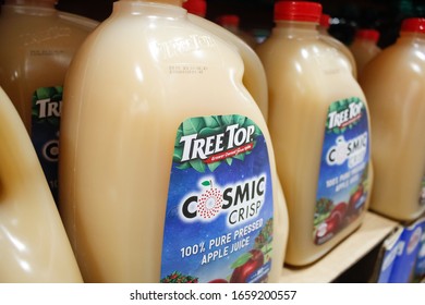 Alhambra, California/United States - 02/19/2020: A View Of Several Large Containers Of Tree Top Cosmic Crisp Apple Juice On Display At A Local Big Box Grocery Store.