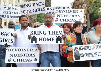 ALICANTE, SPAIN - May 14: Protestors Holding Bring Back Our Girls Signs For Over 200 Girls Abducted By  Boko Haram From A School In Chibok, Nigeria. Alicante May 14, 2014. 