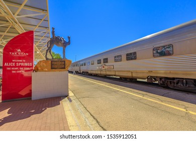 Alice Springs, Northern Territory, Australia - Aug 29, 2019: The Ghan Memorial: Statue Of Afghan Worker And Camel And Arrival Of Legendary Train The Ghan In Alice Springs Train Station.